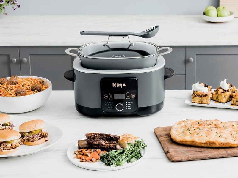 The Ninja Foodi PossibleCooker Pro in the kitchen with dishes.