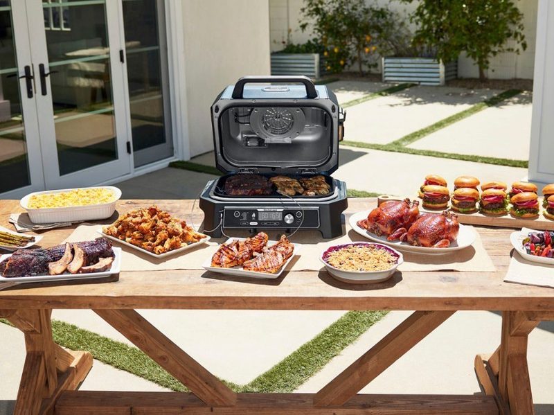 A table of food made by the Ninja Woodfire ProConnect Premium XL 7-in-1 cooker.