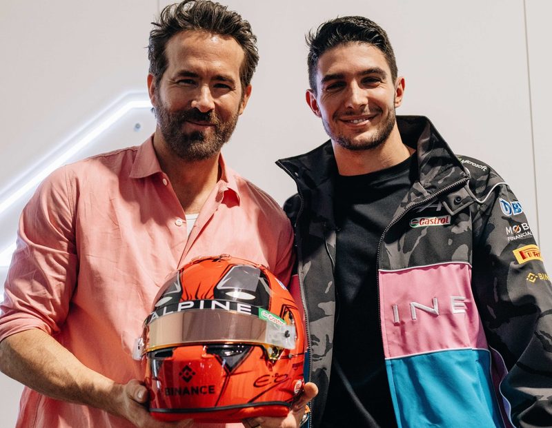 Ryan Reynolds and Estaban Ocon with Deadpool and Wolverine helmet for Alpine F1 team at Belgian GP.