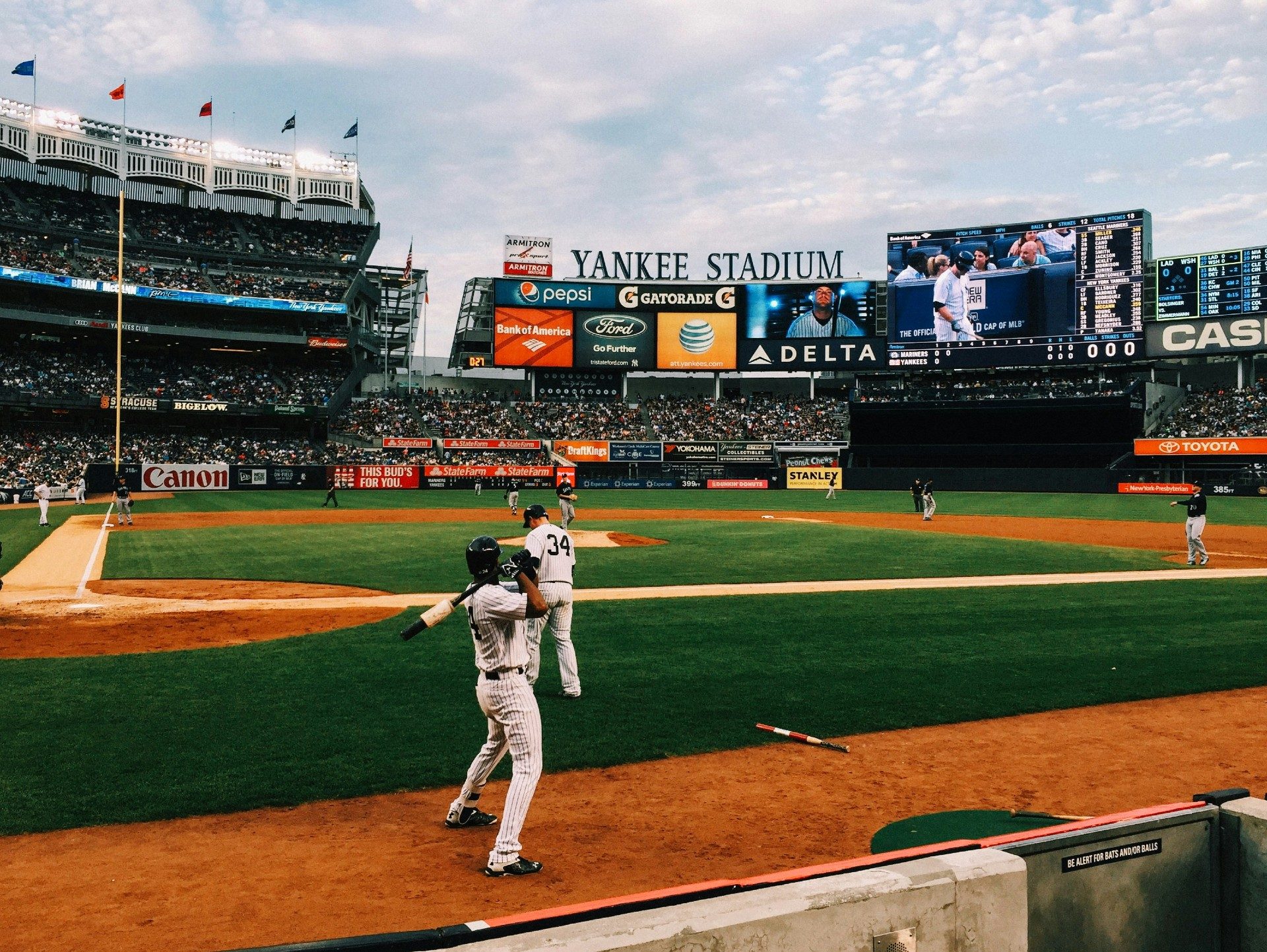 Players warming up at Yankees Stadium
