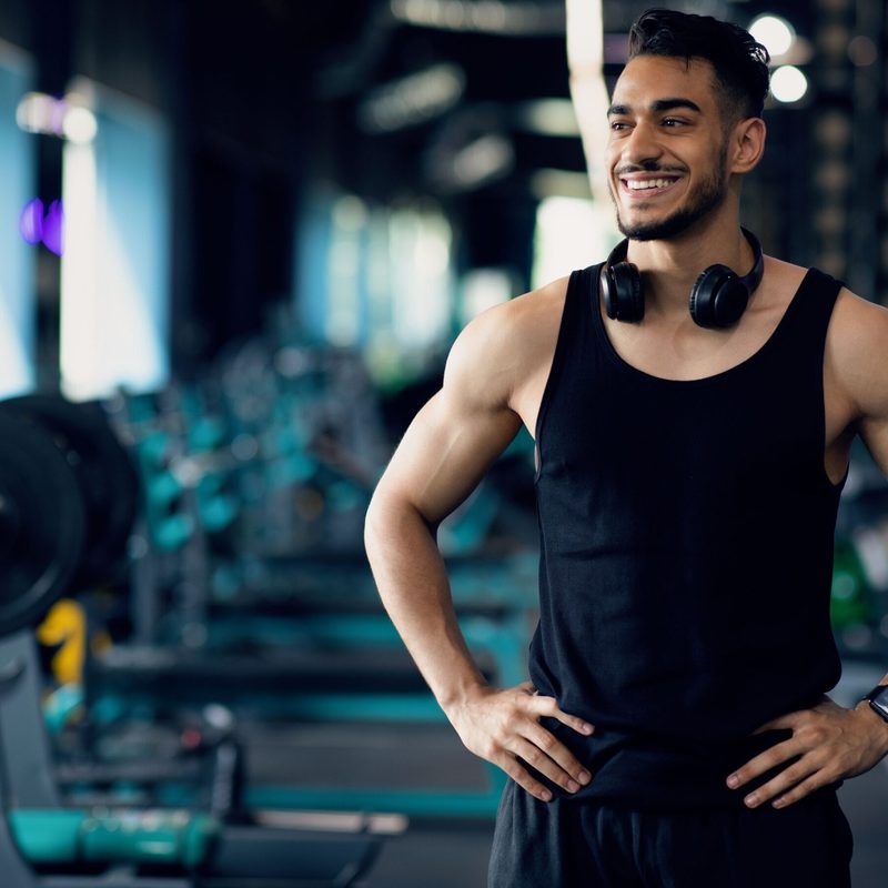 Happy Young Muscular Middle Eastern Male Athlete