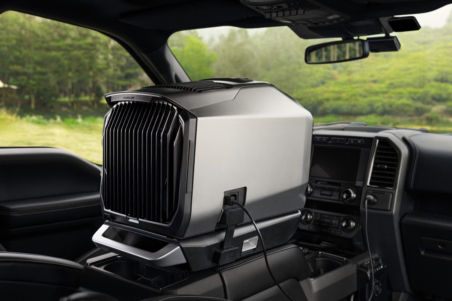 EcoFlow Wave 2 Portable Air Conditioner in the front seat of a vehicle.