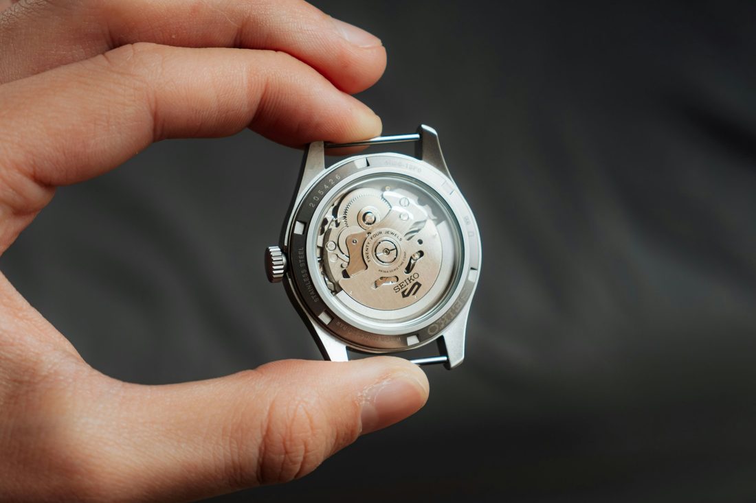 closeup on mechanical movement on watch