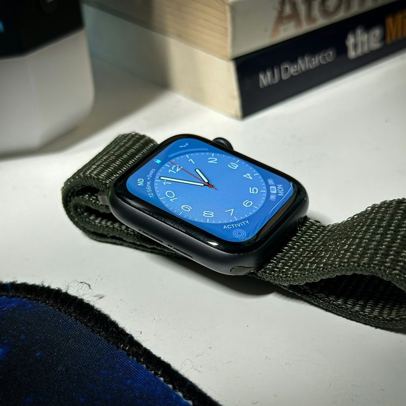 Apple Watch sitting on desk open