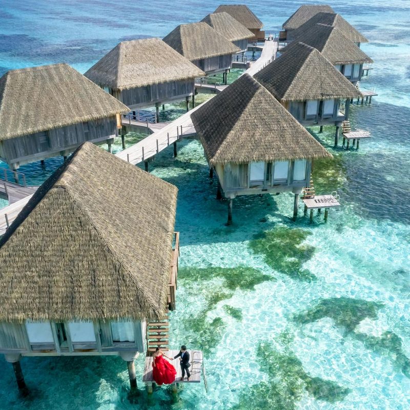 aerial photography of bungalows in water