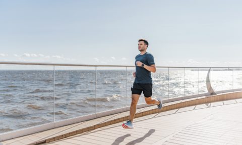 Man running by water