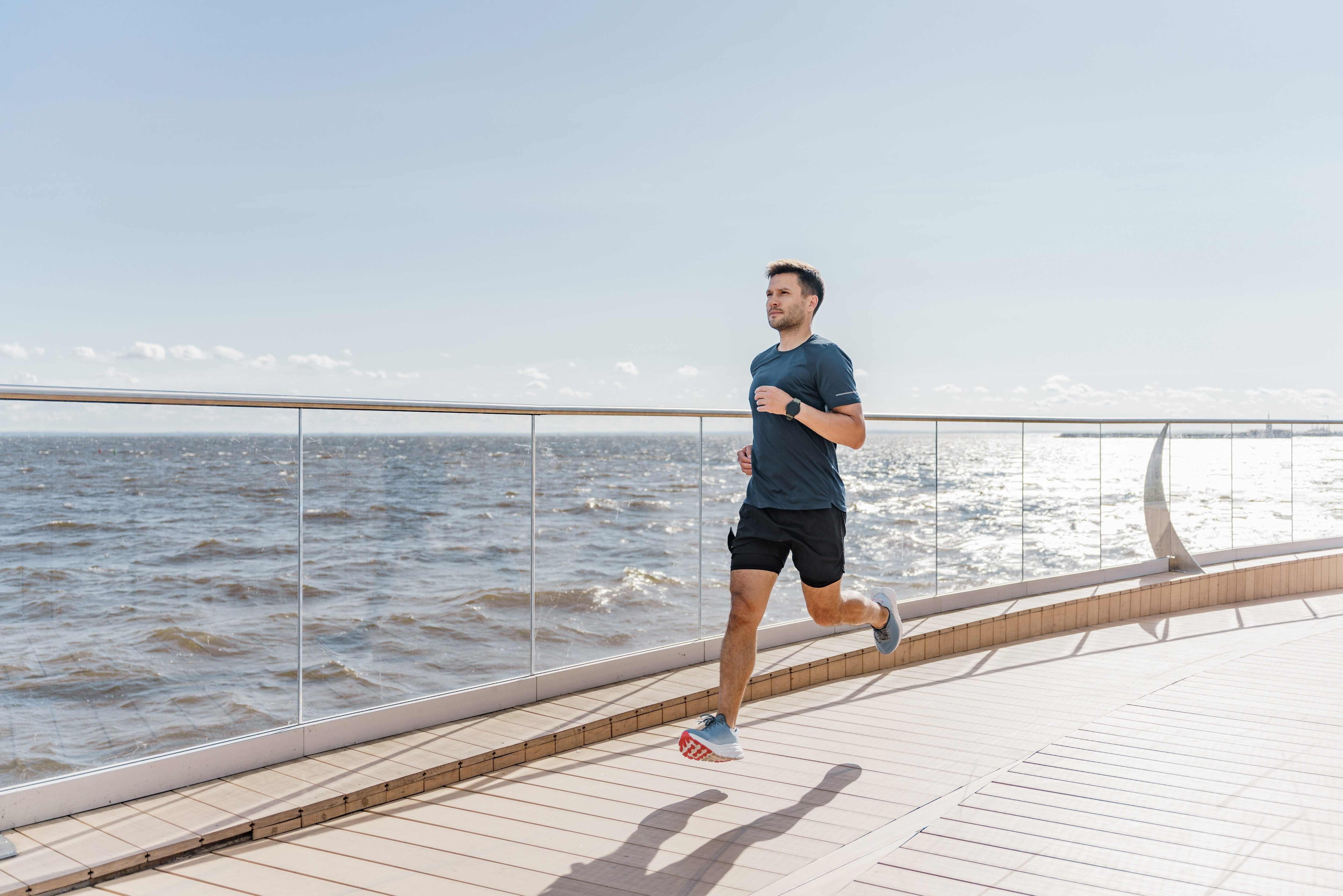 Man running by water
