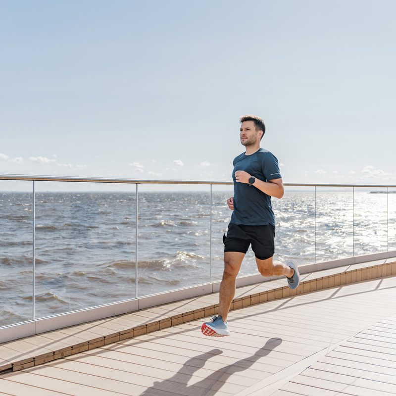 Man running by water