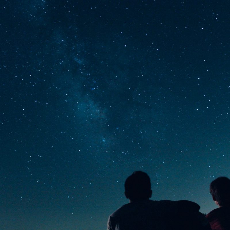 Two people watching stars