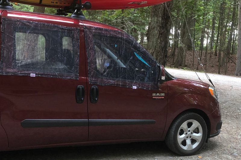 Skeeter Beeter automotive window screens installed on a RAM truck.