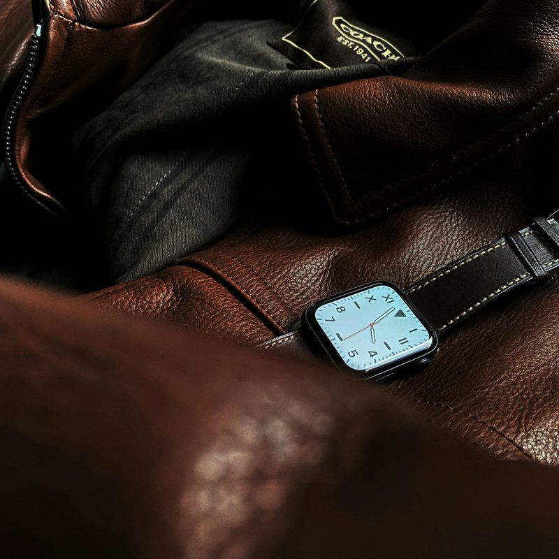 Apple Watch laying on coat