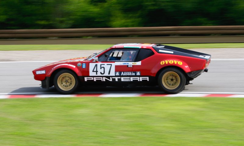 1972 De Tomaso Pantera Group 4 on a race track left profile view.