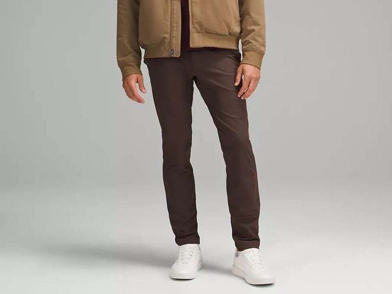 A man wearing Lululemon's ABC Slim-Fit Trouser Warpstreme.