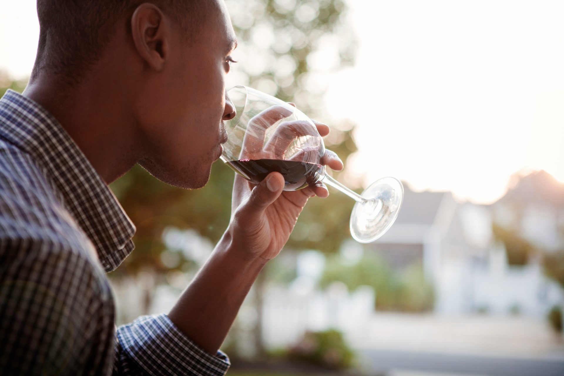 Man drinking red wine