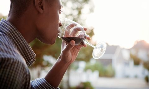 Man drinking red wine