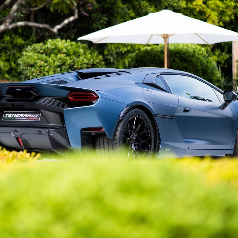 Blue Lamborghini Temerario right rear three-quarter view at Pebble Beach during Monterey Car Week.