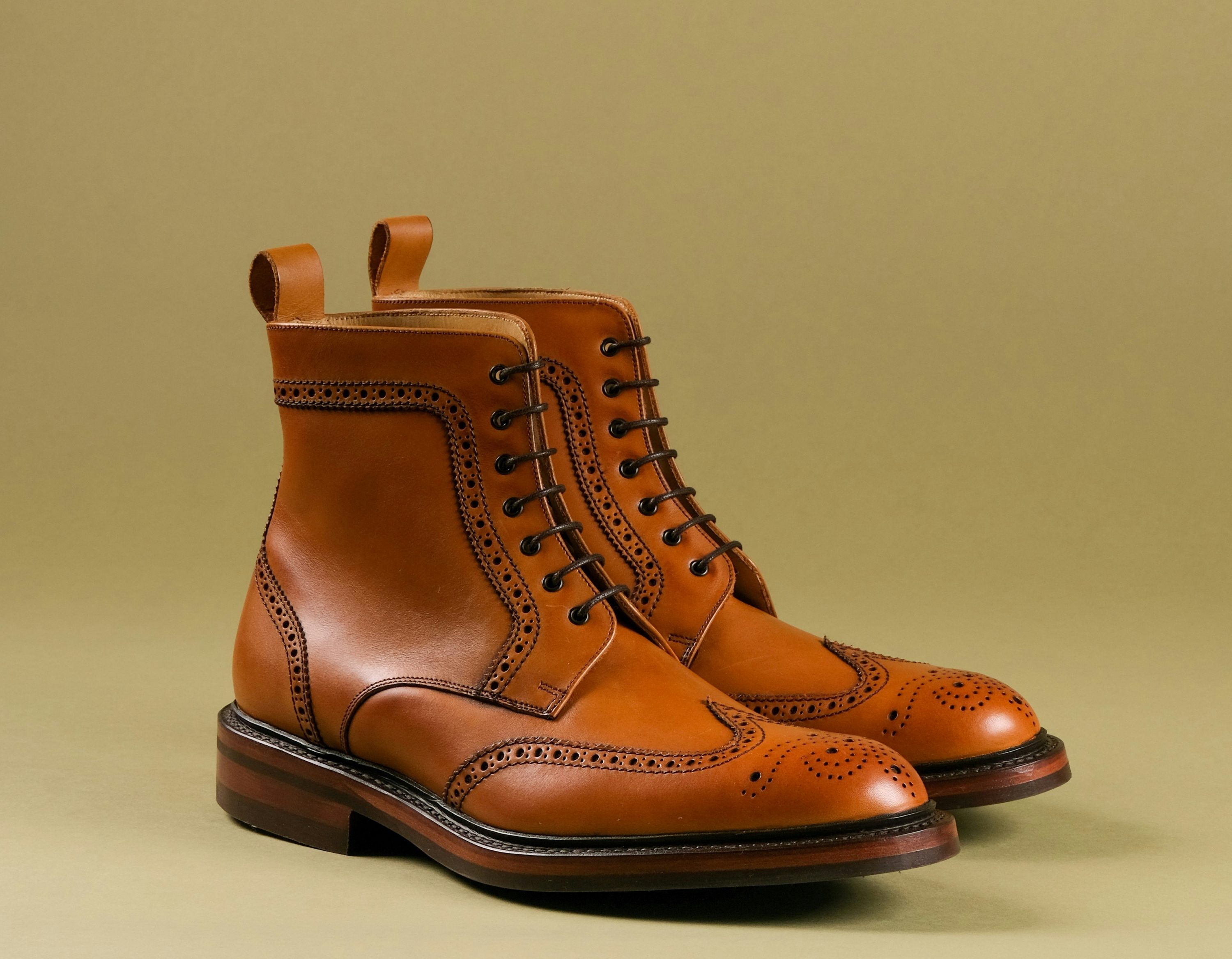 Brogued dress boots