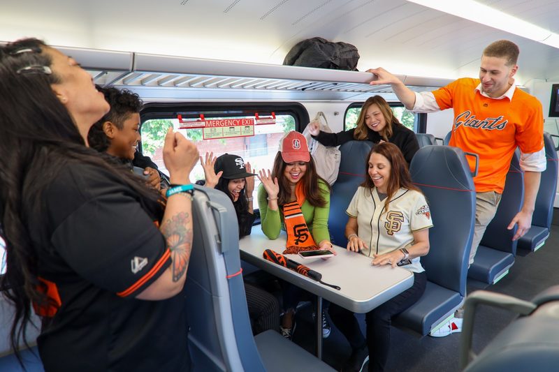 Passengers on new electric Caltrain