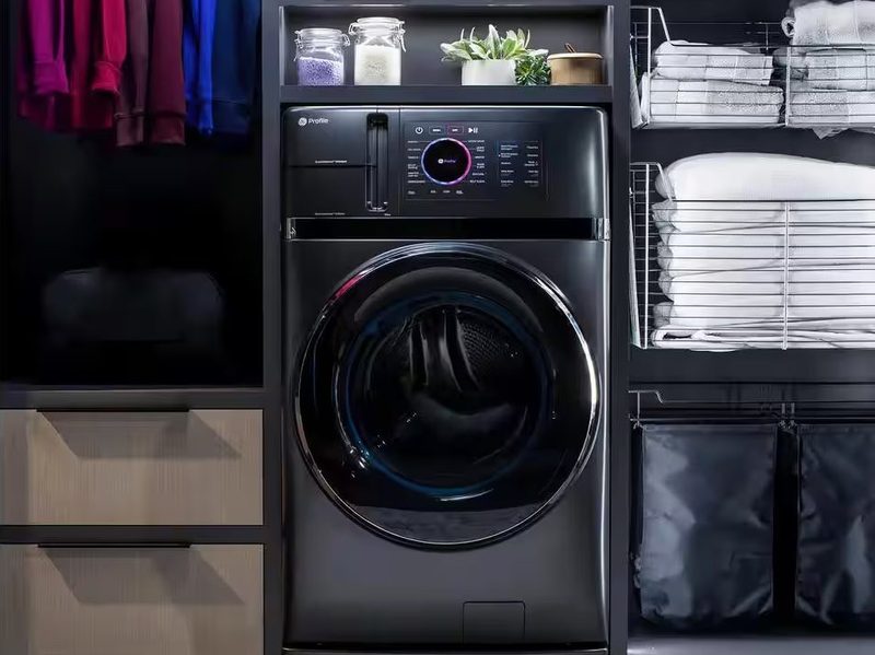 The GE Profile Smart Washer Dryer Combo shown in a home.