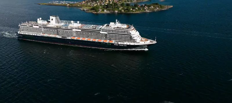 Holland American cruise ship along coast