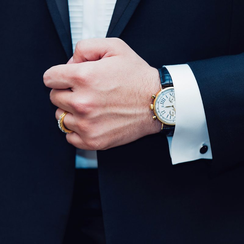 Man in tux with ring and watch