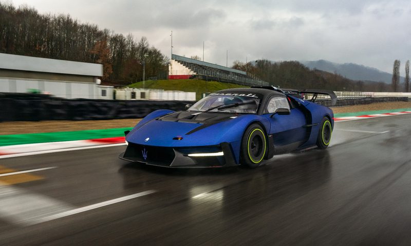 Maserati MCXtrema on a wet race track left front three-quarter view.