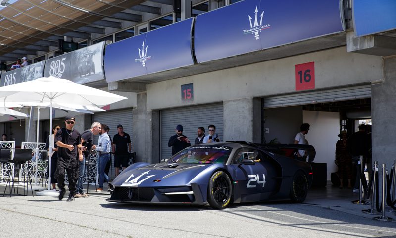 Maserati MCXtrema in race track garage at Leguna Seca during Monterey Car Week.