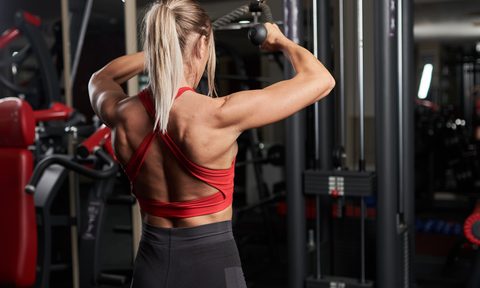 Woman doing face pulls