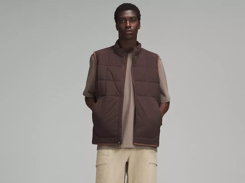 A man wears Lululemon's Men's Route Ready Lightweight Insulated Vest.