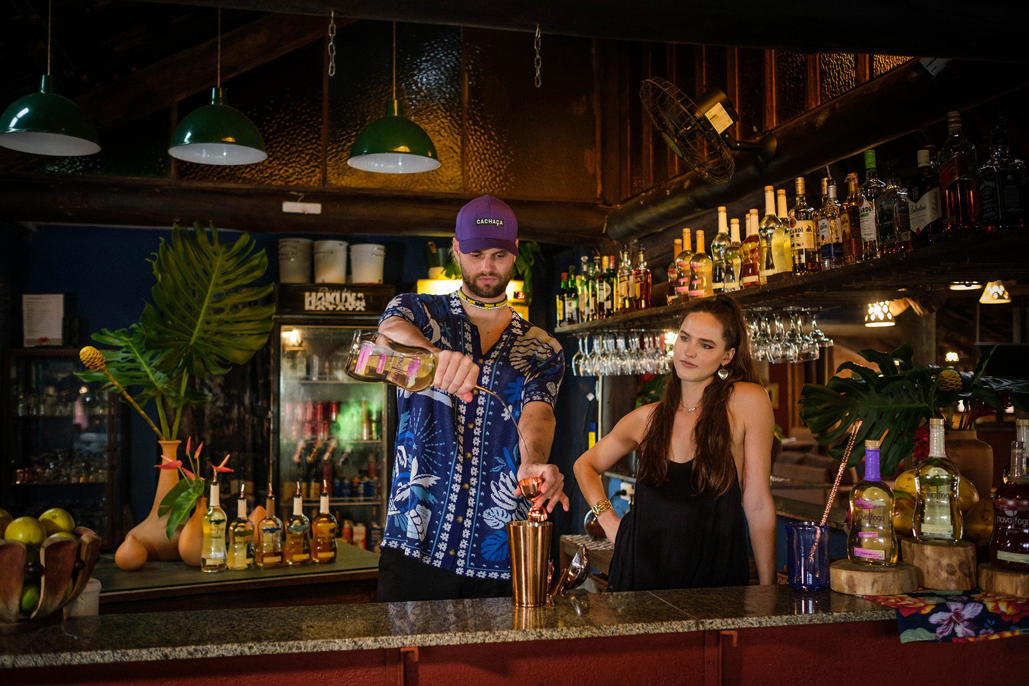 Summer-in-Morretes-SOFI-TUKKER-making-novo-fogo-cachaca-drink