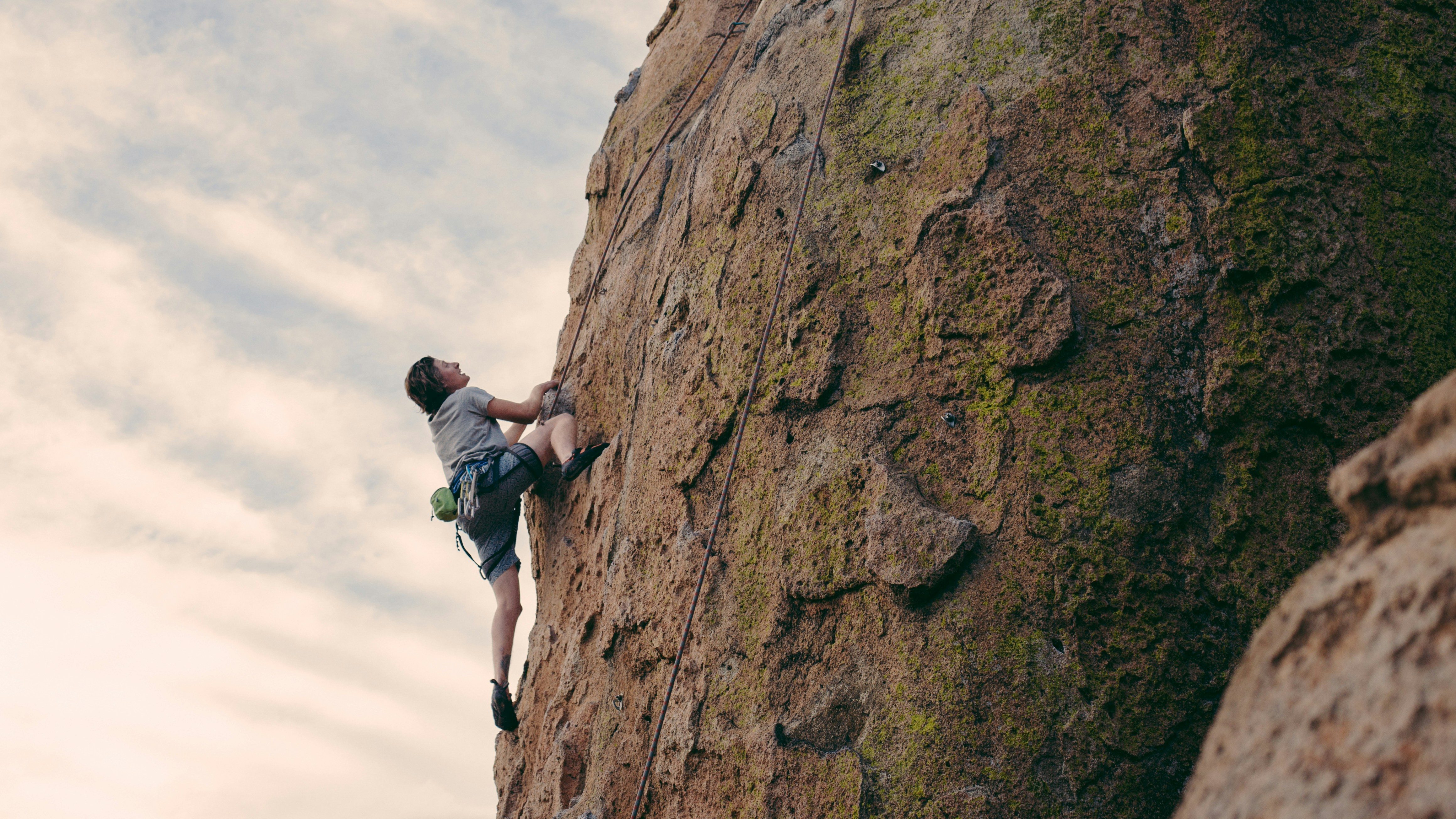 Man climbing a mountain.