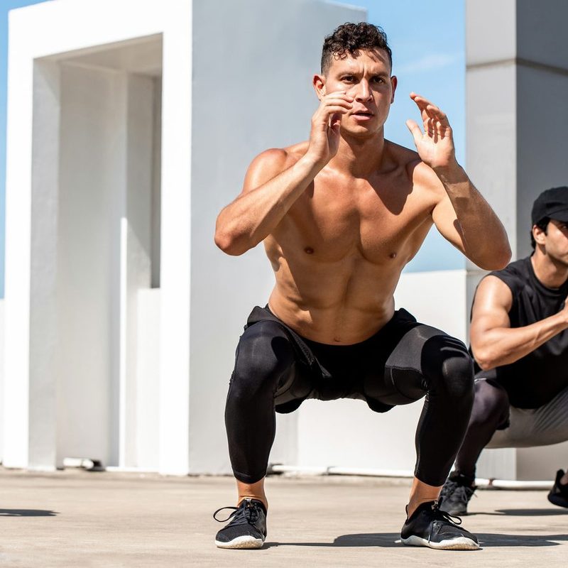 Man doing air squats