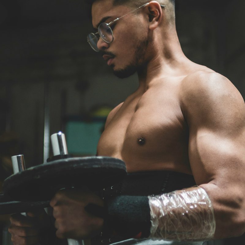Man doing hammer curls.