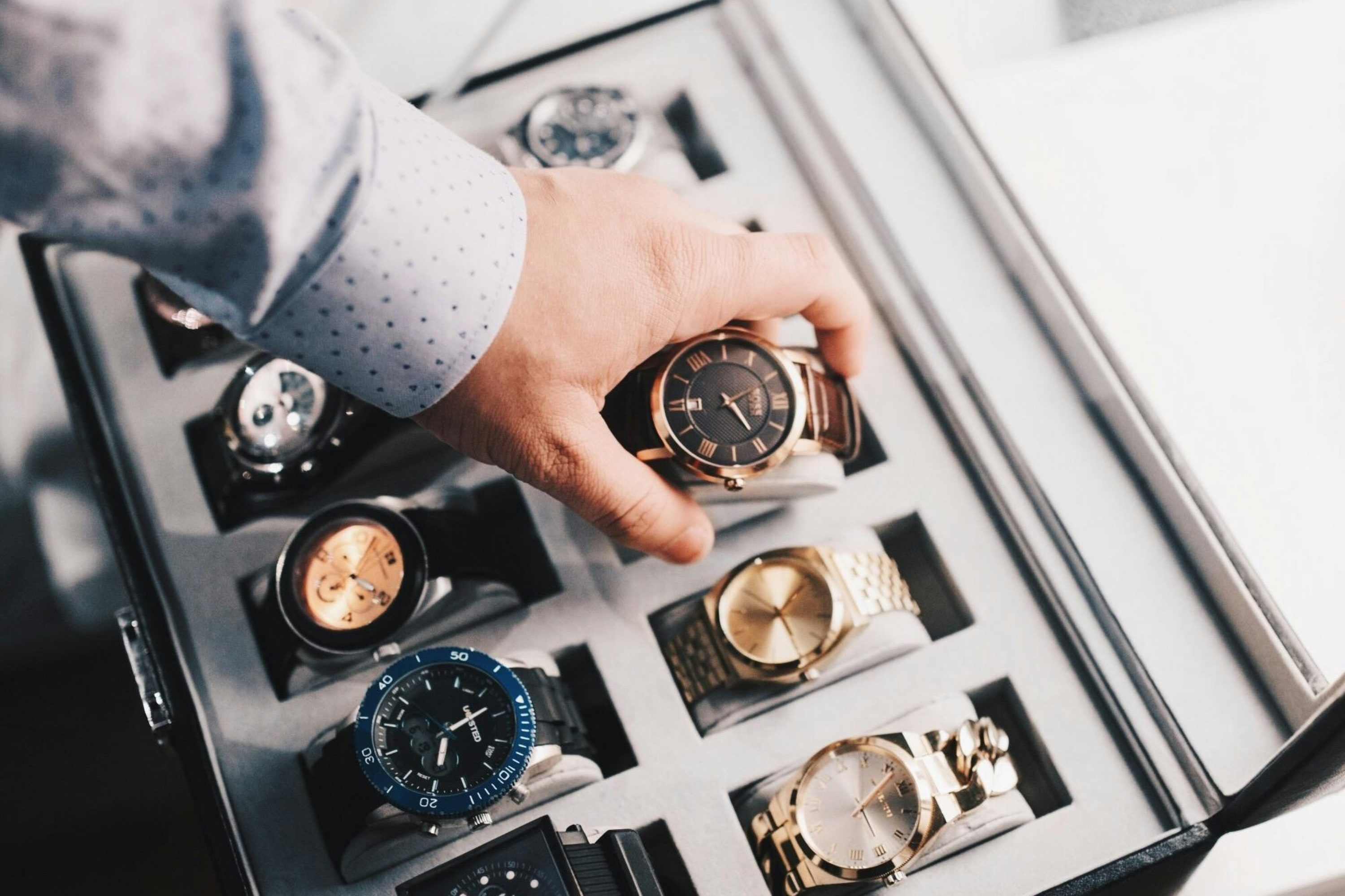 Man with watch collection