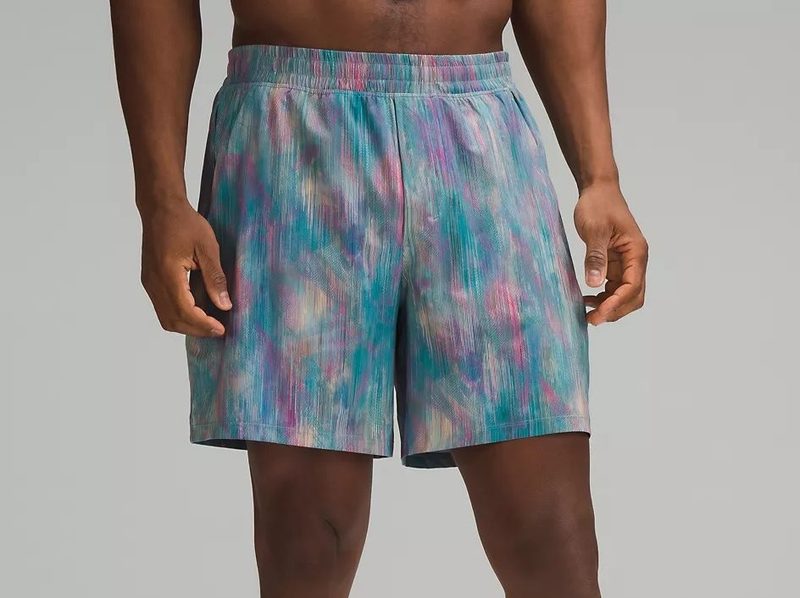 A man wearing the Pace Breaker Lined shorts from Lululemon.