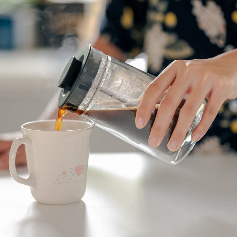 Pouring coffee from a French press
