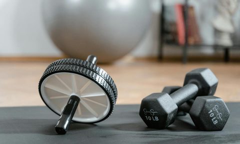 Ab roller with hand weights and yoga ball