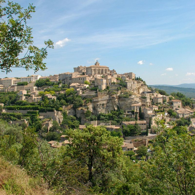 Town on a hill during the day in Provence, France