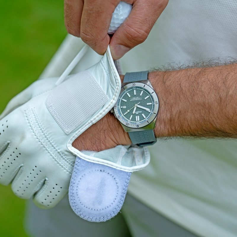 Putting on golf gloves