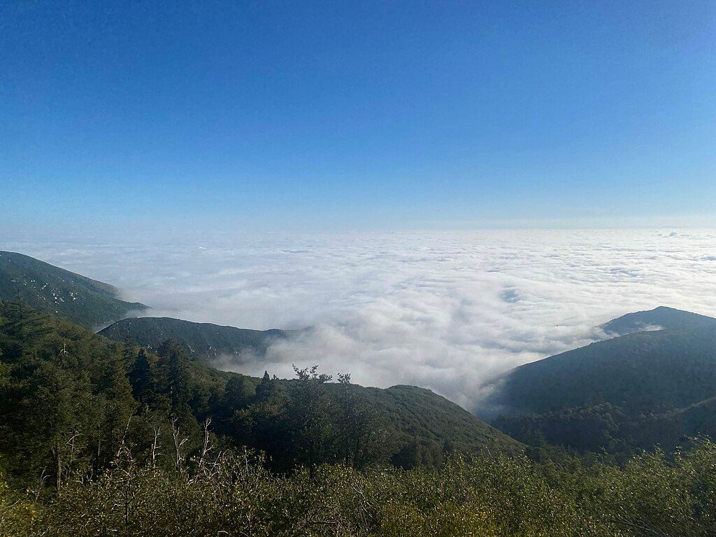 A cloud-filled valley view along the Rim of the World scenic drive