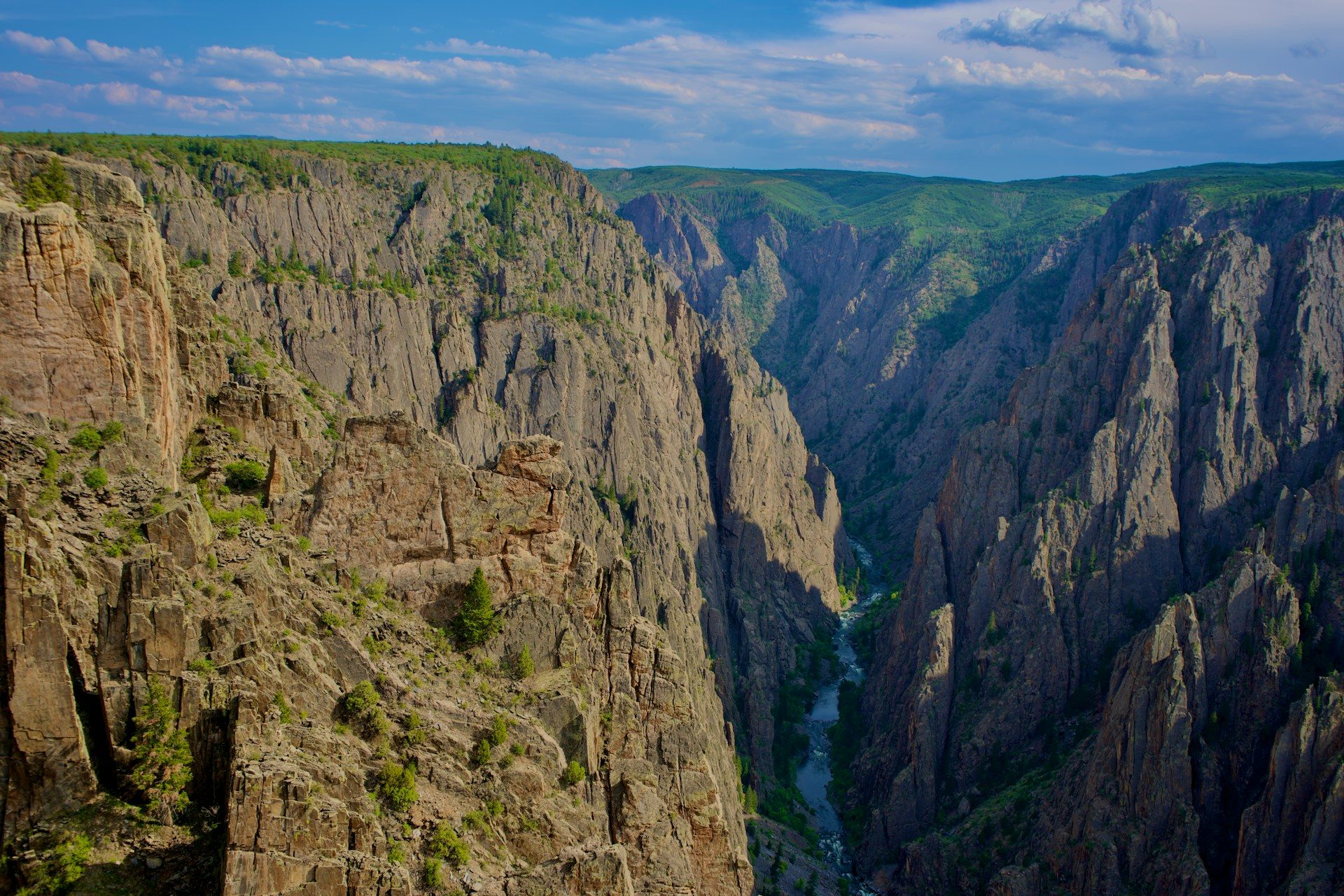 Canyon view with a rver at the base in the vally