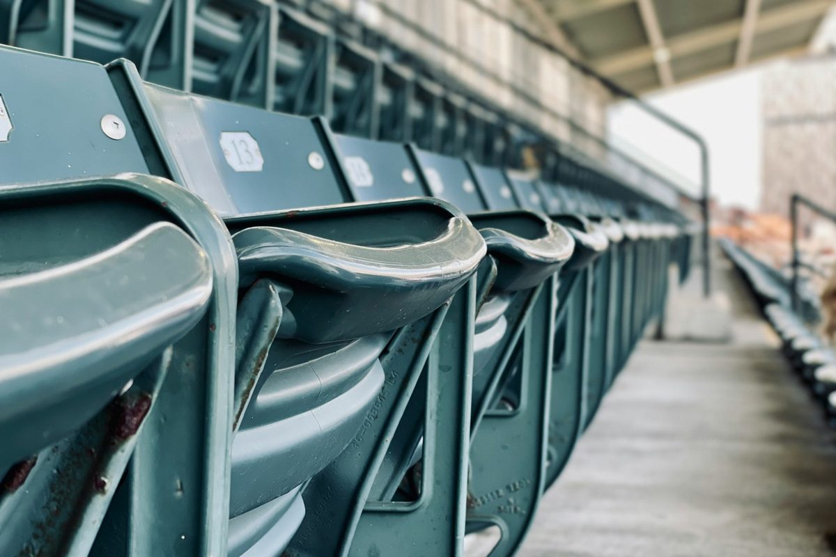 Row of empty seats at a stadium.