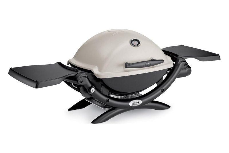 Weber Q1200 Liquid Propane Grill isolated on a plain white studio background.
