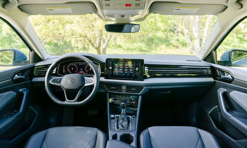 2025 VW Jetta interior showing front seats, console, and dashboard.