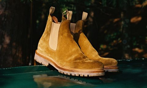 outsider ii boot sitting in nature on table
