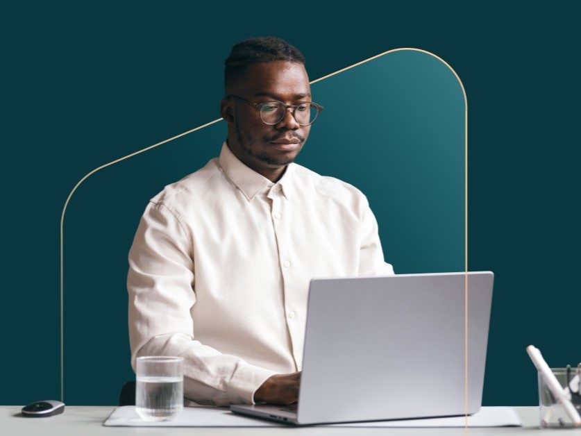 Man using Dashlane credential management tool on desktop to log in