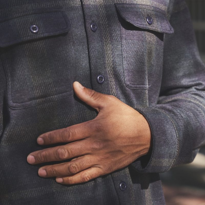 Man wearing DUER performance flannel