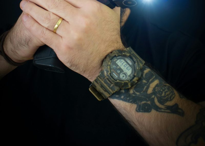 Man wearing tactical watch