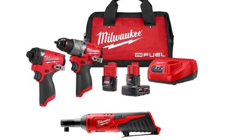 The contents of the Milwaukee M12 Fuel hammer drill and impact driver combo kit.