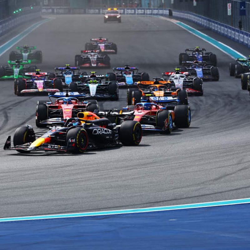 Race cars at the start of the 2024 F1 Miami Grand Prix.